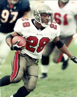 Warrick Dunn running football for Buccaneers